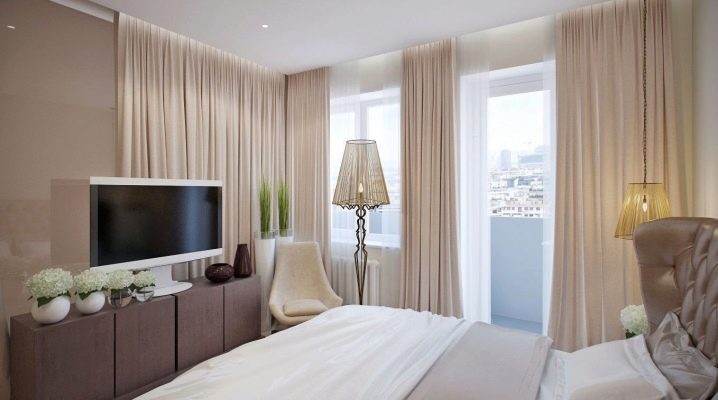Beige curtains in the bedroom interior