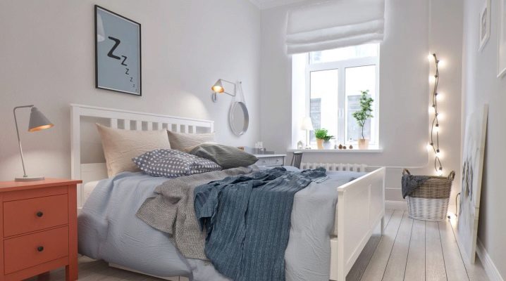 Scandinavian style bed in the interior of the bedroom