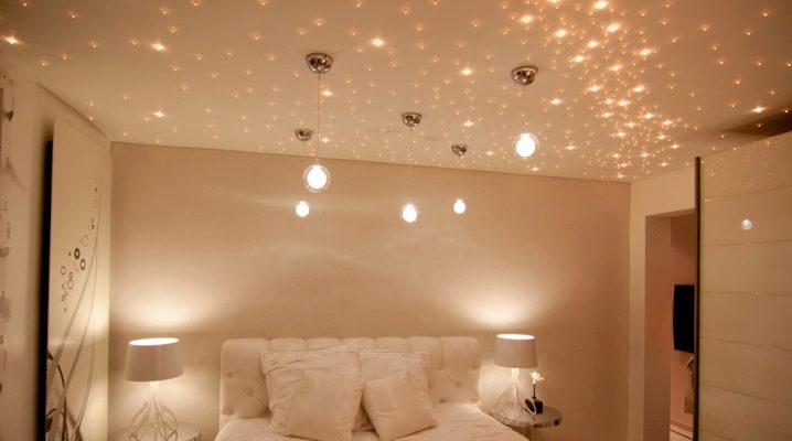 The location of the lamps on the ceiling in the bedroom