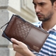 Men's leather purses: varieties and features of choice