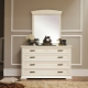 Varieties of dressers with a mirror in the bedroom and their choice