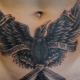 Pārskats par vīriešu vēdera tetovējumiem un to pielietošanas niansēm