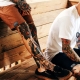 Variety of men's knee tattoos