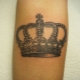 Tipuri de tatuaje de coroană pentru bărbați și plasarea lor
